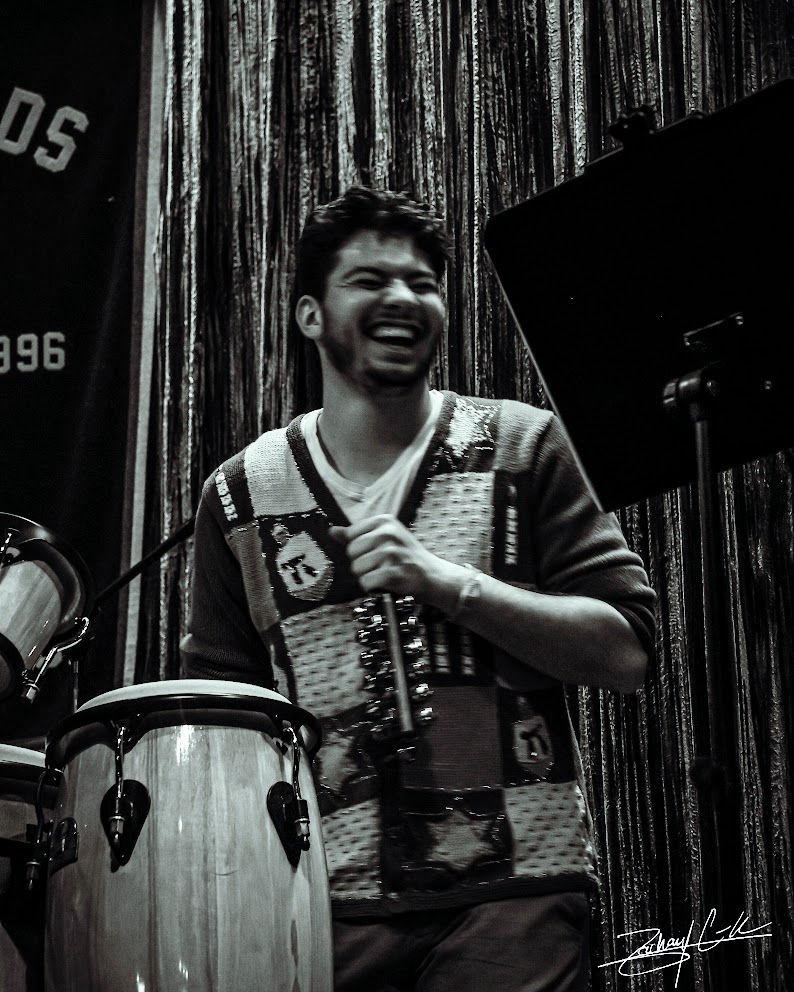 Ezri Abraham playing percussion